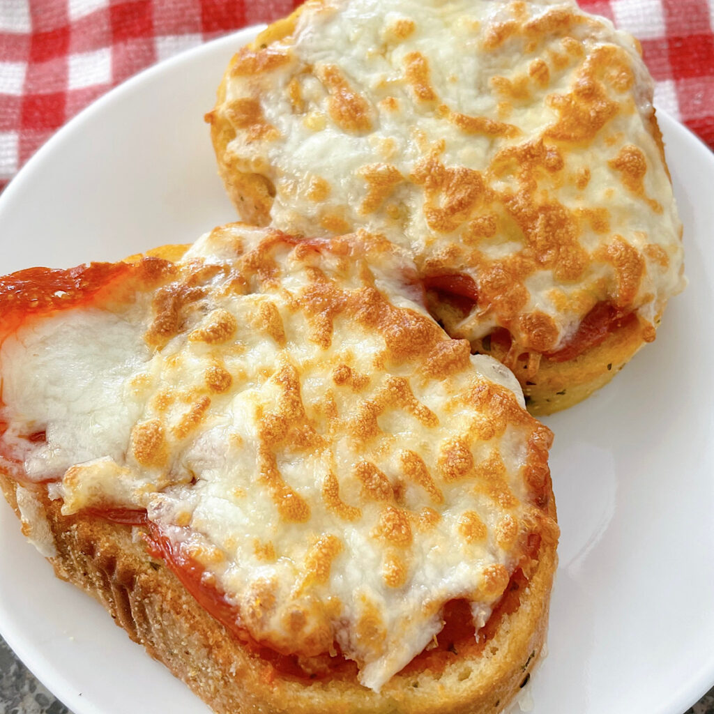 Garlic Bread Pizza on a white plate.