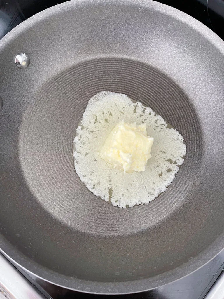 Butter melting in a saucepan.