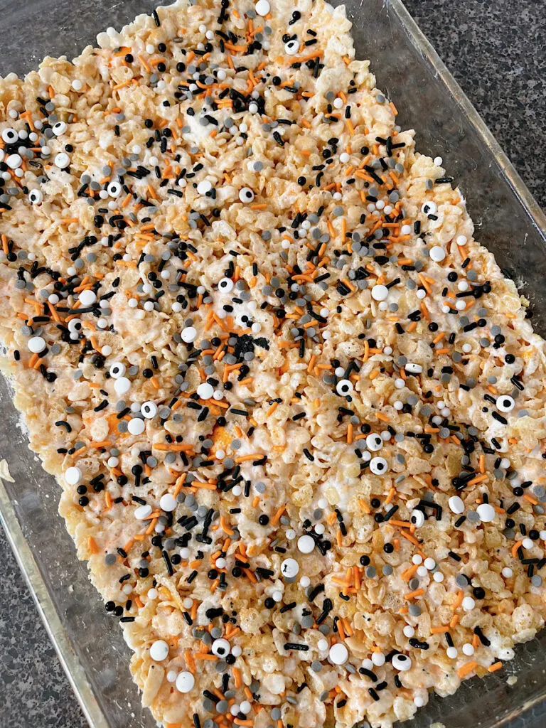 A pan of Halloween Rice Krispie Treats with sprinkles.