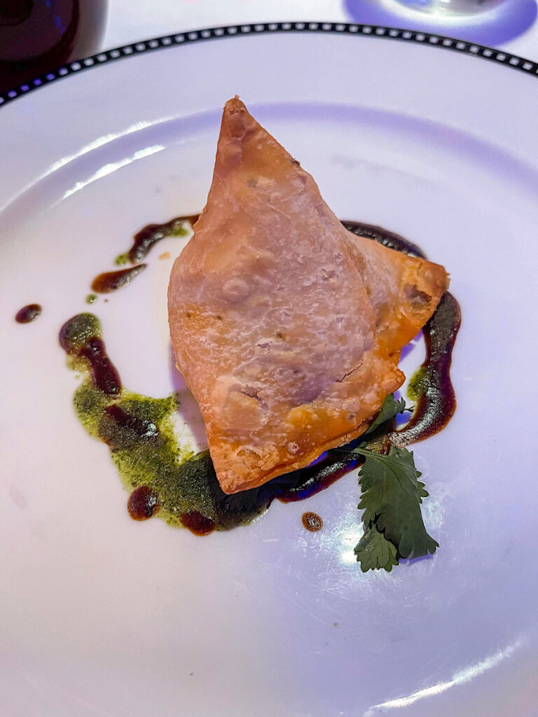 Vegetable Samosa: With Potato, Peas, Garlic, Cumin and Ginger served with Tamarind and Mint Chutney from Pirate night on the Disney Magic.