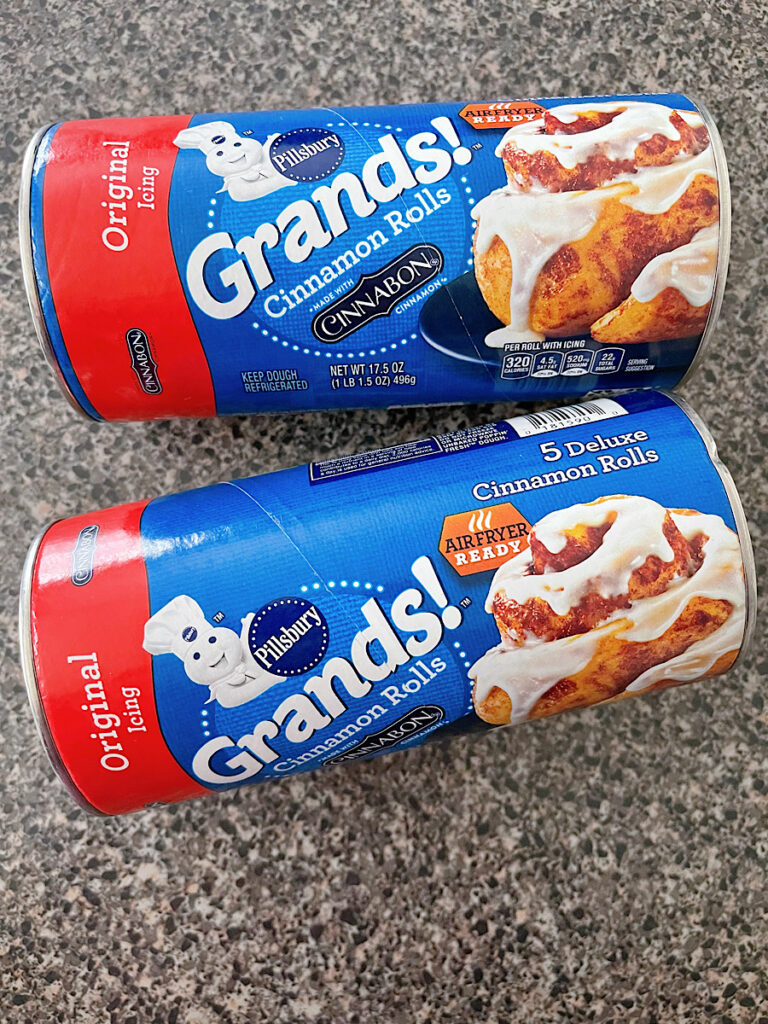 Two cans of Pillsbury Grands Cinnamon Rolls.