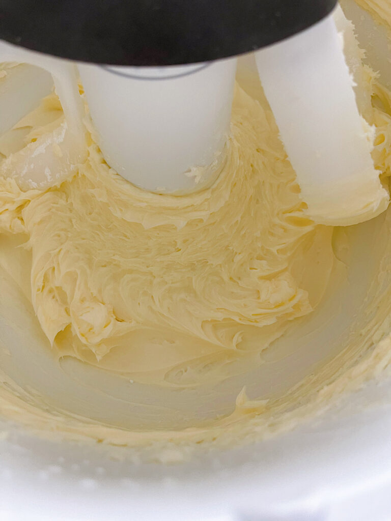 Butter and powdered sugar mixed together in a stand mixer.