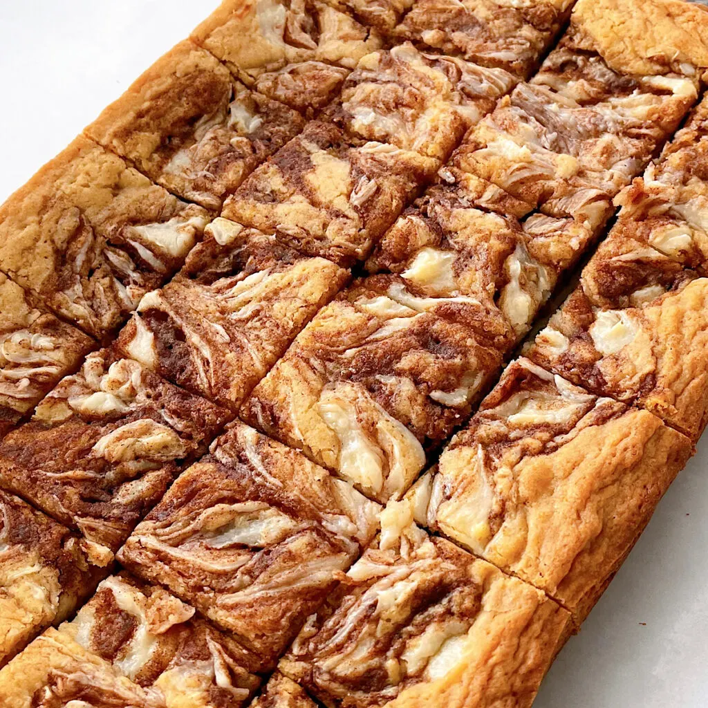 Cinnamon Roll Blondies cut into squares.