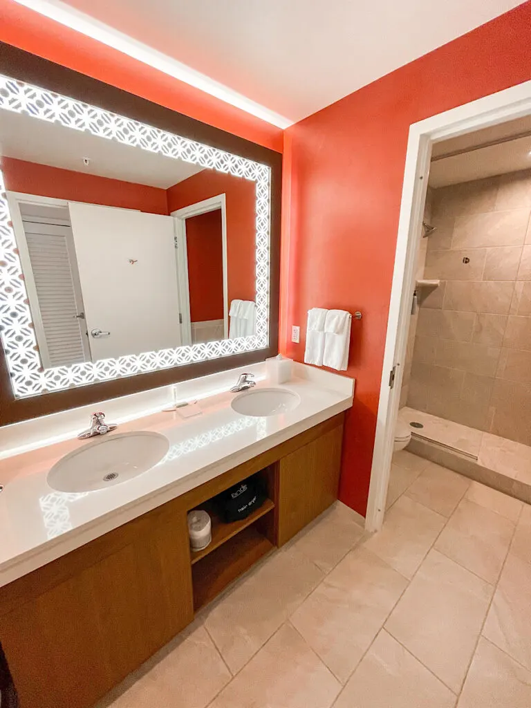 Guest room bathroom vanity with two sinks at Courtyard Anaheim.