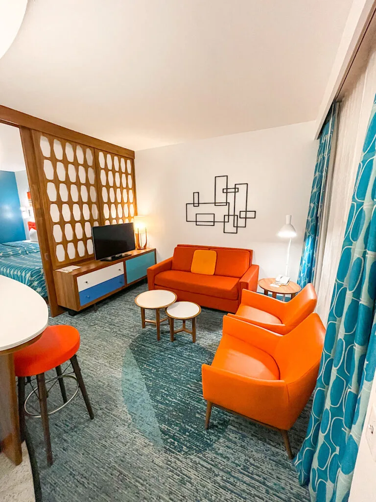 Living room of a family suite with a sofa sleeper at Universal's Cabana Bay Beach Resort.