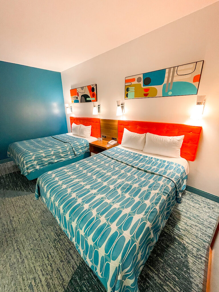 Two queen beds in a family suite at Universal's Cabana Bay Beach Resort.