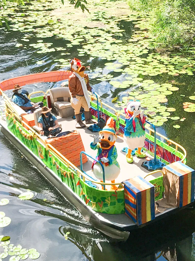 Disney characters on a boat at Disney's Animal Kingdom.