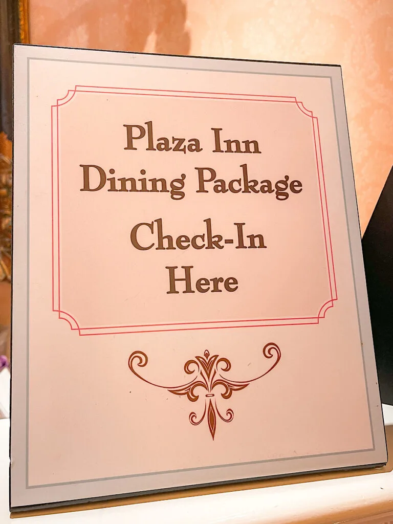 A sign for the plaza inn dining package.