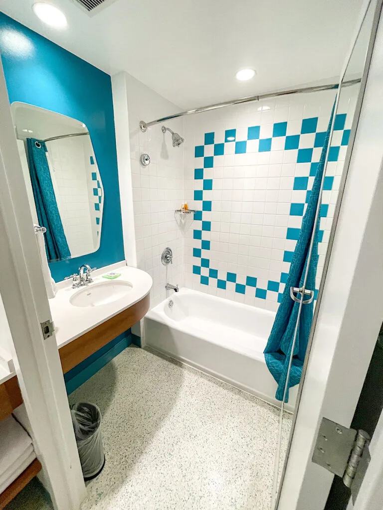 Shower and bath tub in a family suite at Cabana Bay Beach Resort.