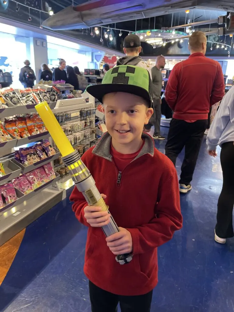 Building a lightsaber in Tomorrowland at Disneyland.