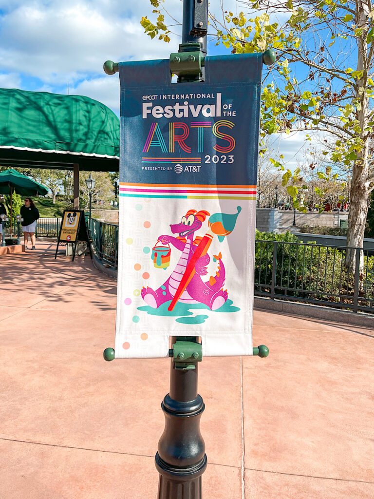 A banner for Festival of the Arts at Epcot.