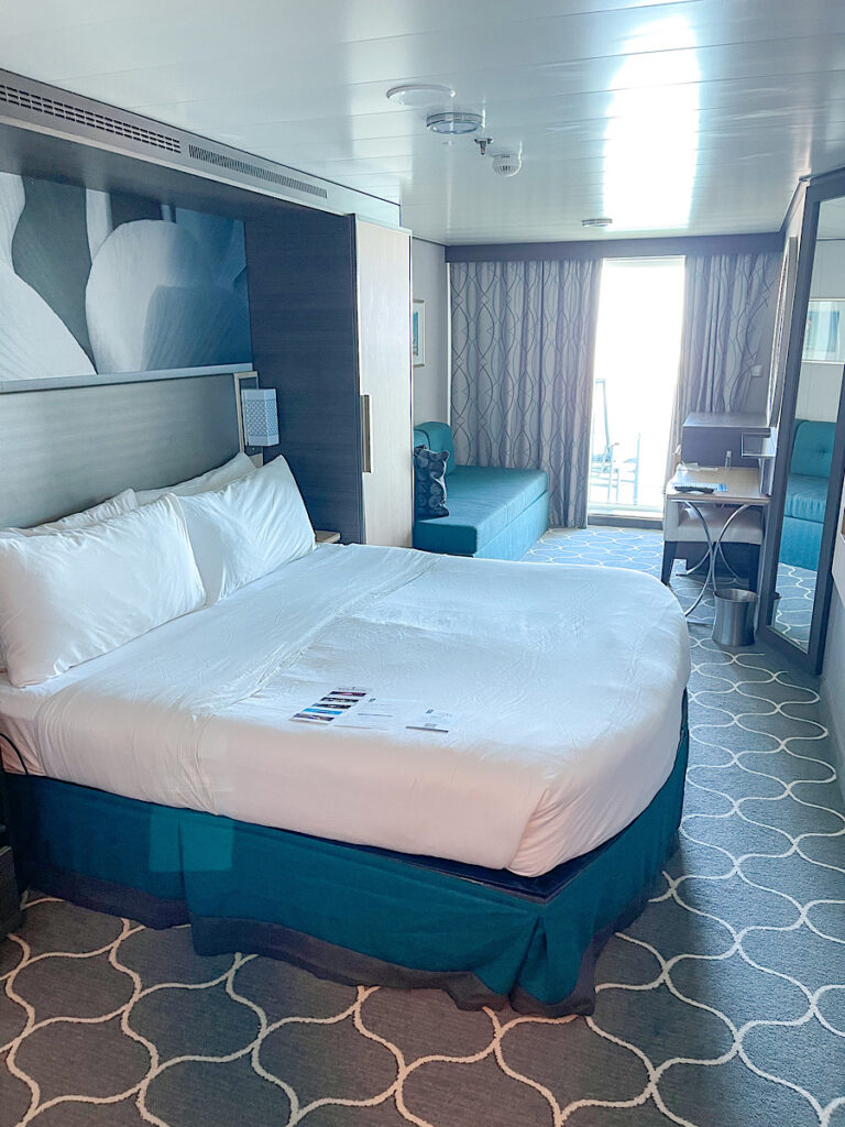 Bed and sitting area of Royal Caribbean Harmony of the Seas 14156.