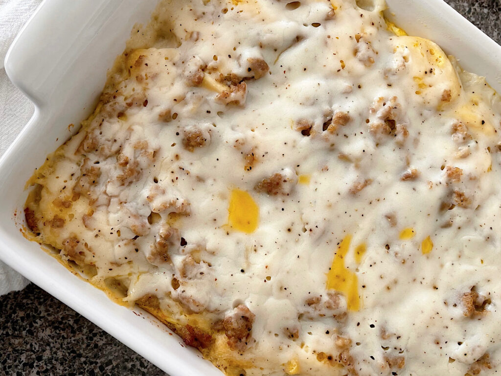 Biscuits and Gravy Casserole in a white dish.