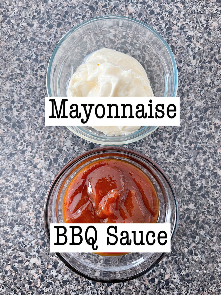 A bowl of mayonnaise and a bowl of barbecue sauce to make Campfire Sauce.