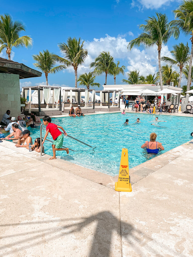 Swimming Pool with a bar at Playa Mia Cozumel Beach excursion.