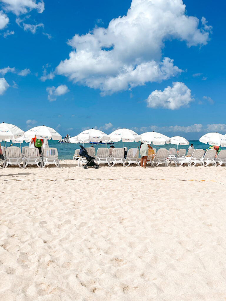 Beach chairs and umbrellas at the Beach in Cozumel.