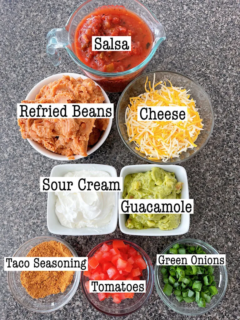 Ingredients to make seven layer dip.