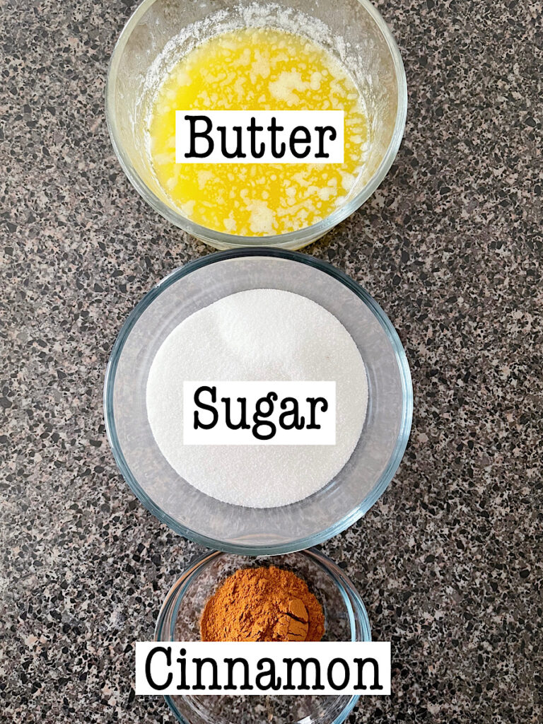 Butter, sugar, and cinnamon to make a cinnamon coating for cream cheese filled pretzels.