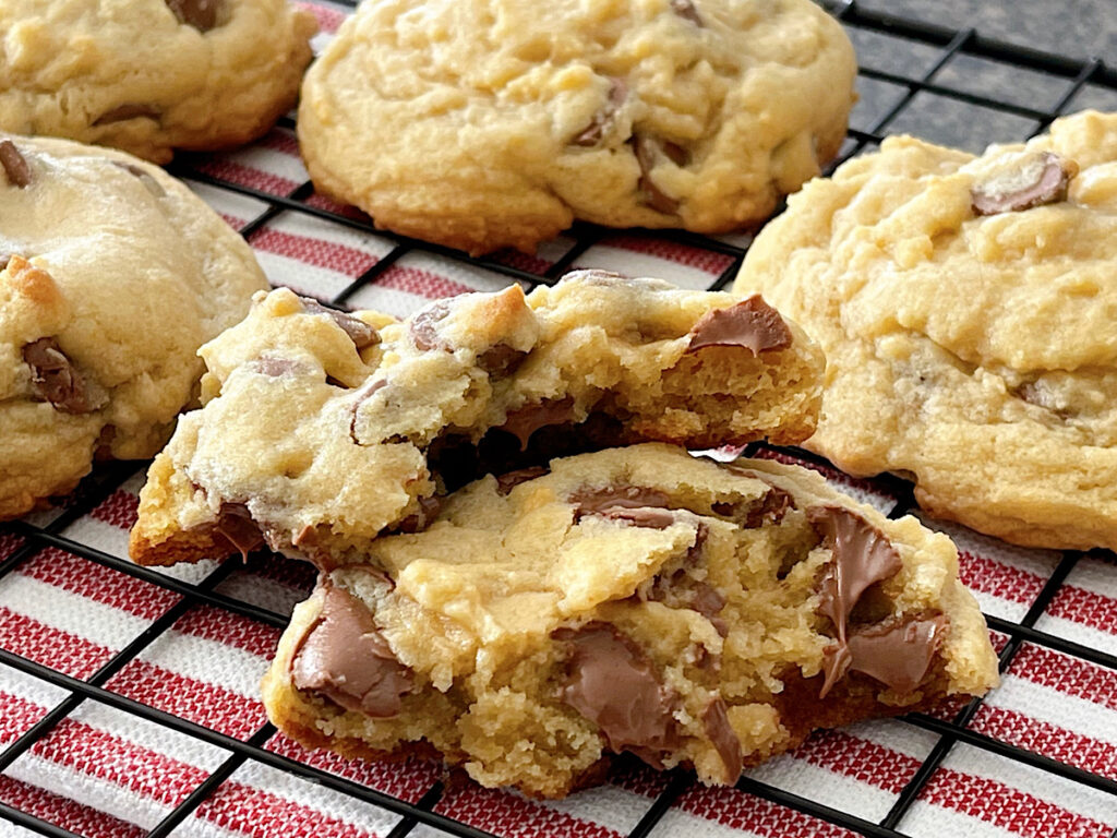 Copycat Crumbl Chocolate Chip Cookies on a cooling rack.