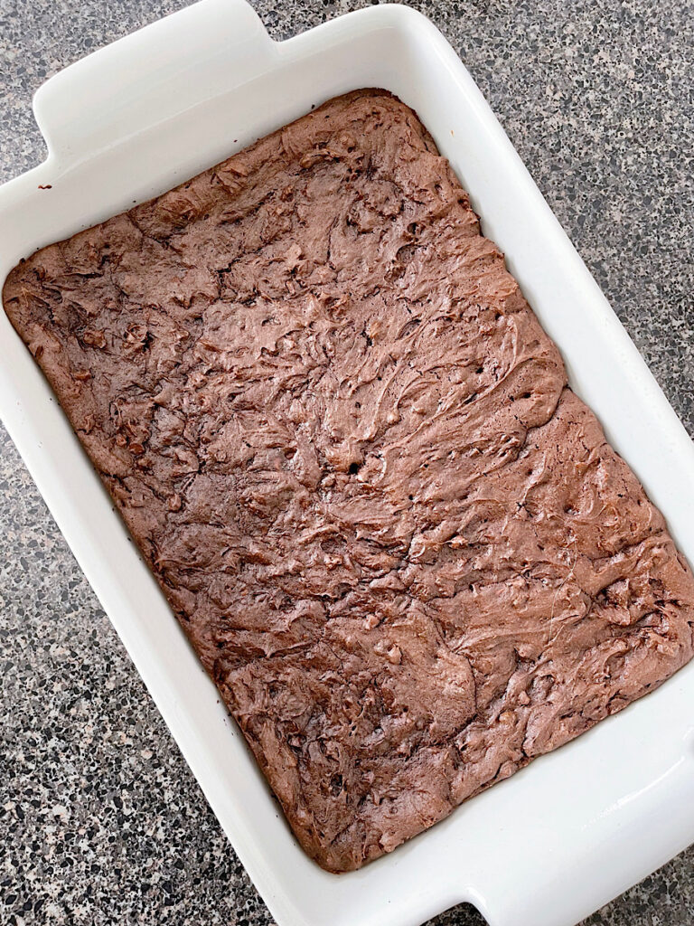 A pan of freshly baked cake mix brownies.