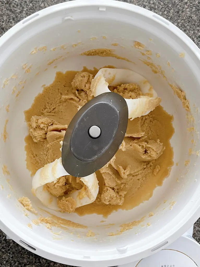 Butter and sugars mixed in a stand mixer.