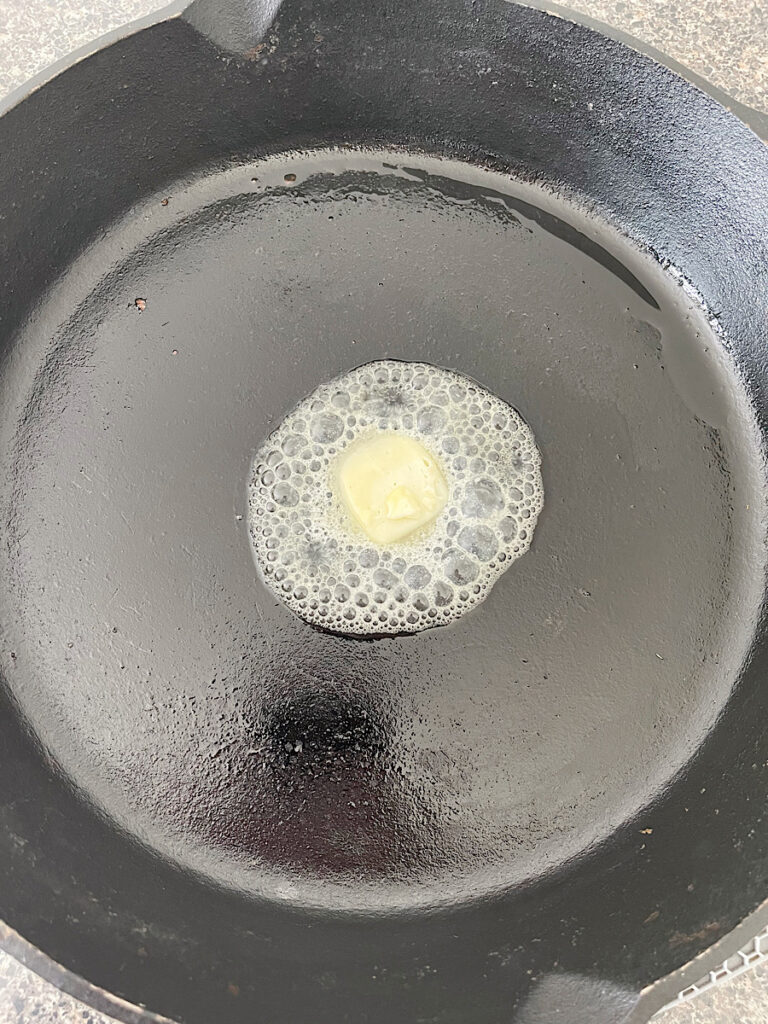 Butter melted in a cast iron skillet