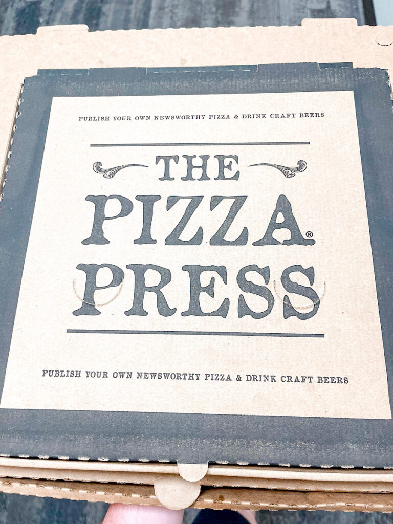 A pizza box from The Pizza Press in Anaheim.