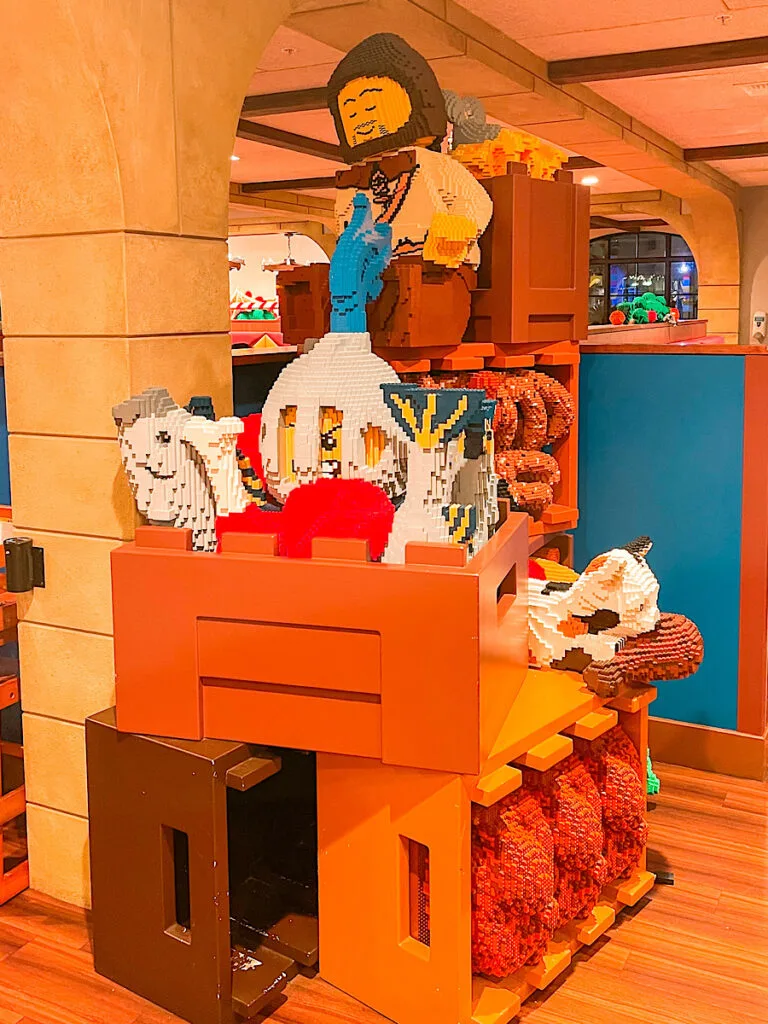 Lego statue inside Dragon's Den restaurant.