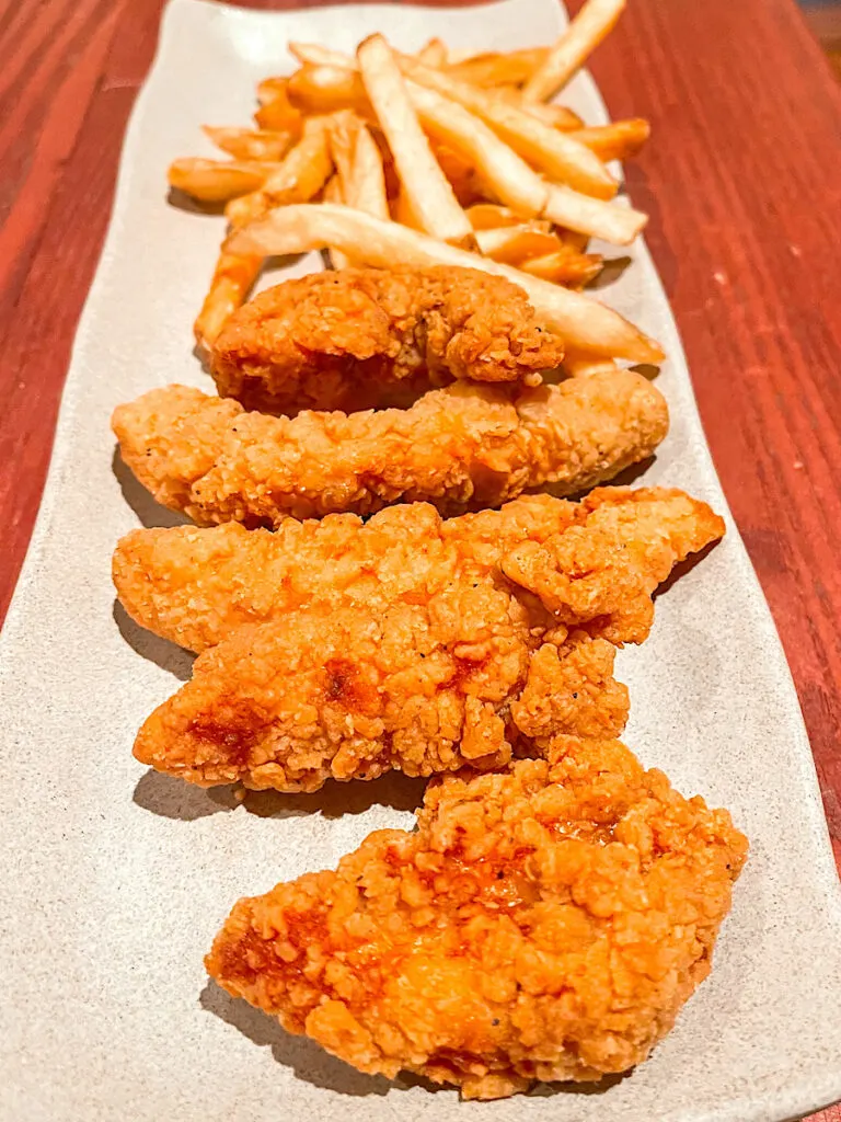 Kids chicken tenders and fries from Dragon's Den.