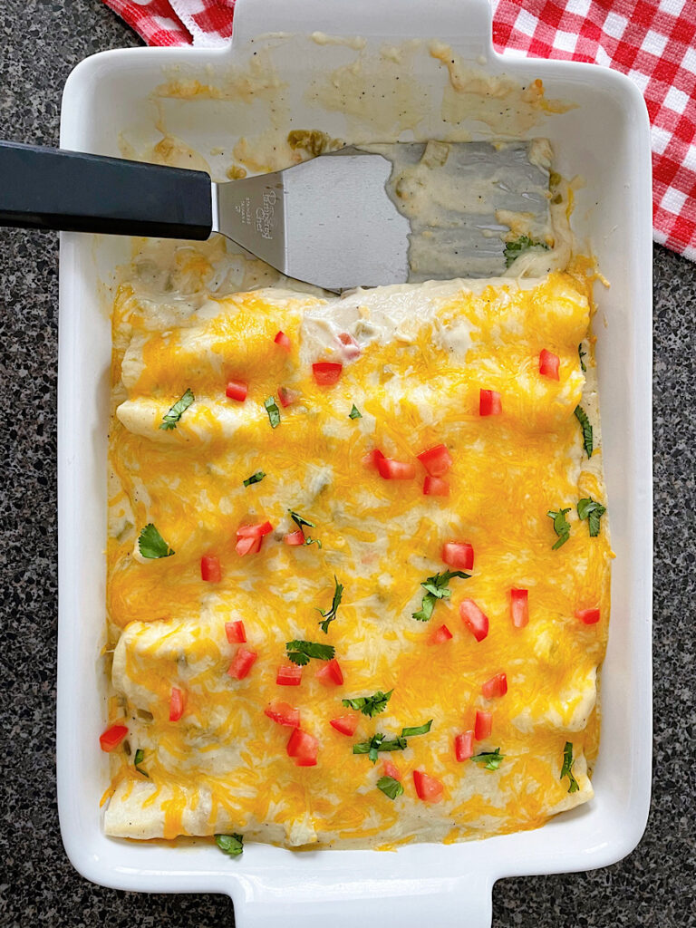 A pan of sour cream chicken enchiladas.