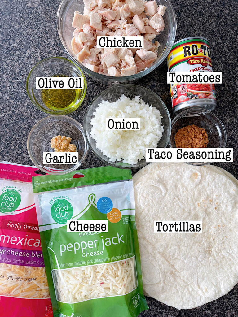 Ingredients to make chicken filling for sour cream enchiladas.