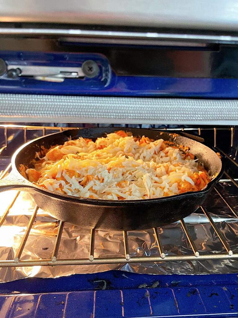 TikTok tortellini in a skillet in the oven.