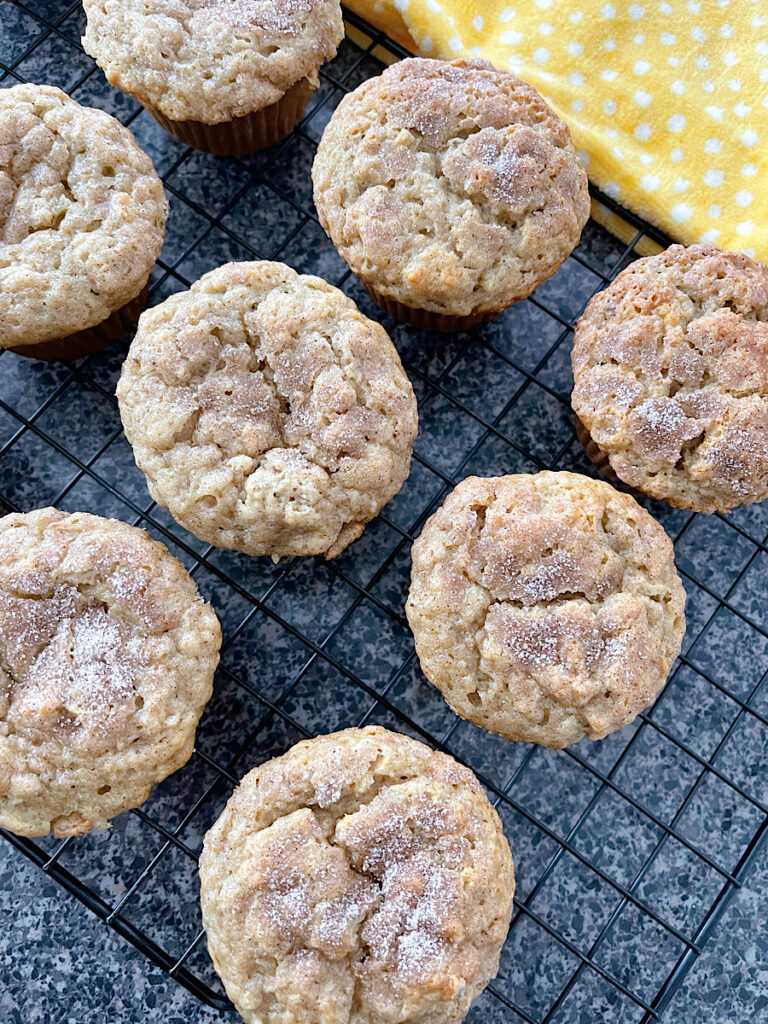 Cinnamon Banana Muffins on a cooling rack.