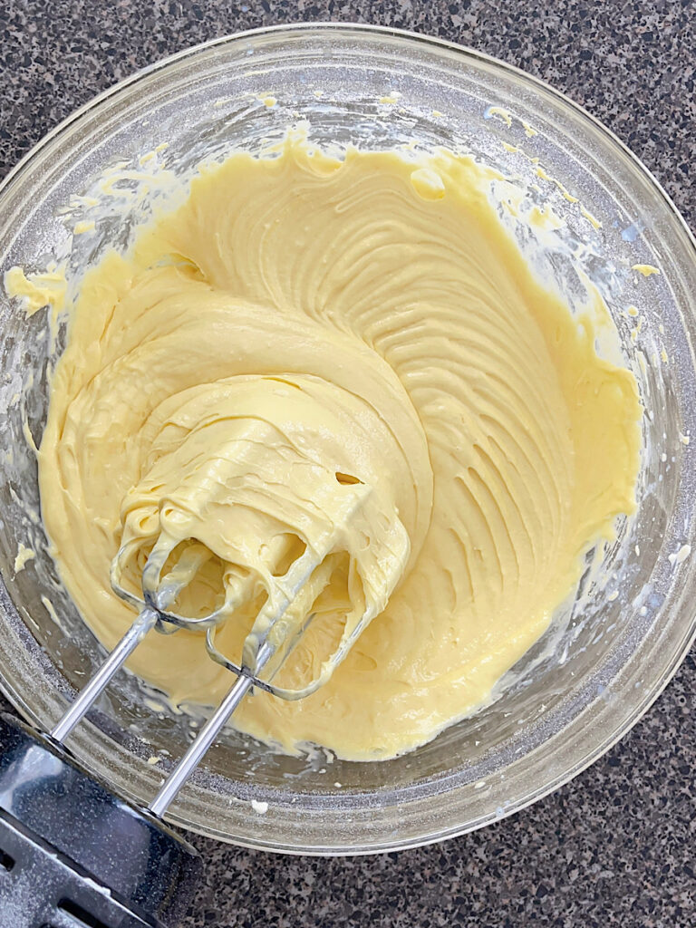 Lemon bread batter in a mixing bowl.
