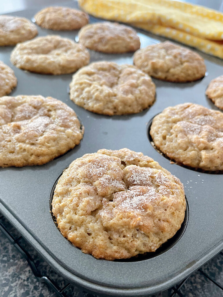 Banana muffins in a muffin pan.