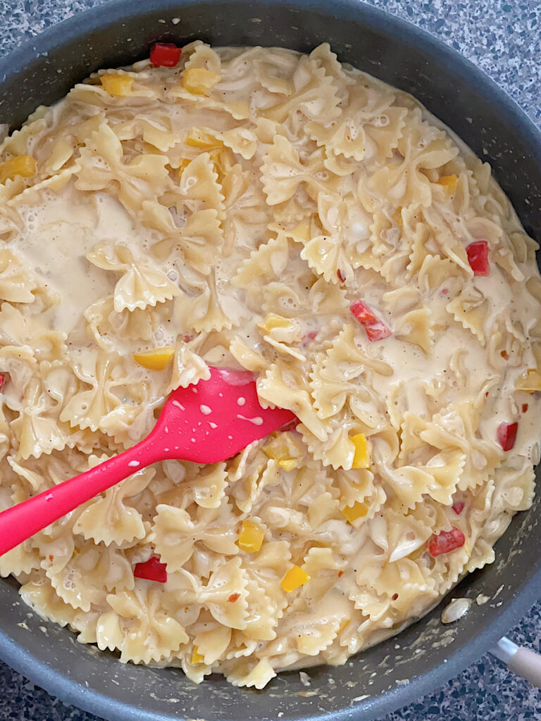 Louisiana Chicken Pasta and sauce in a pan.