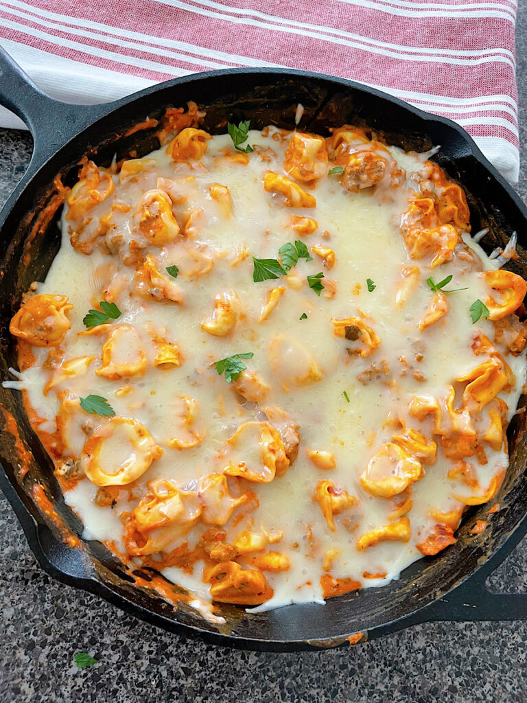 An easy tortellini bake in a cast iron skillet.