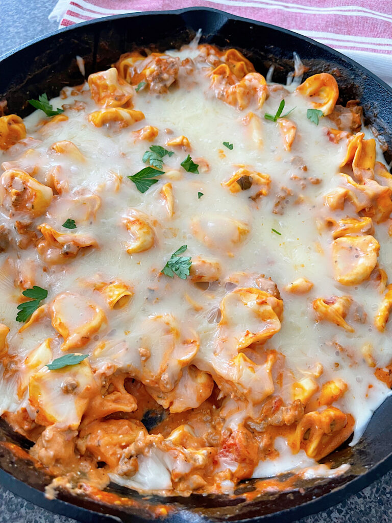 An easy tortellini bake in a cast iron skillet.