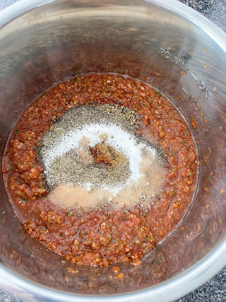 Salsa and spices in a pot.