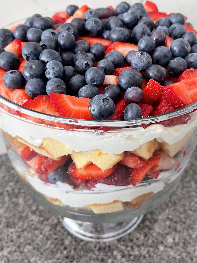 A berry trifle with pound cake, cheesecake filling for the 4th of July.