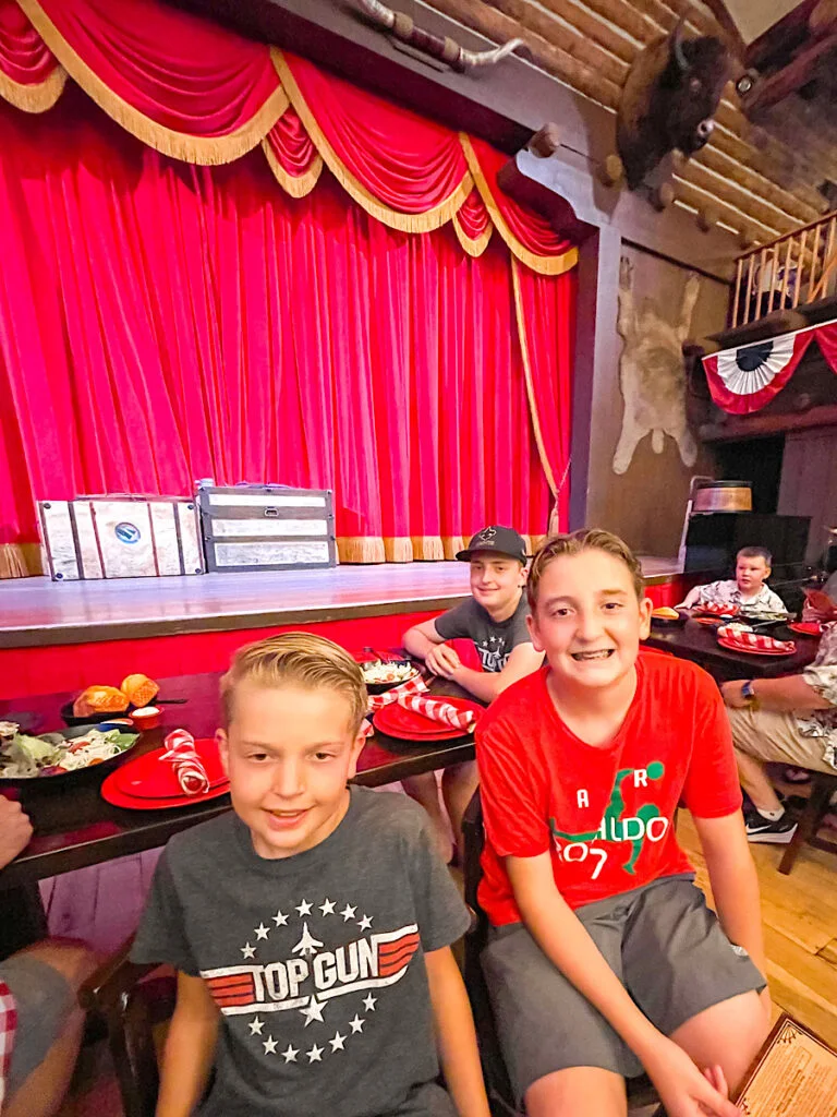 Two kids at the Hoop Dee Doo Revue at Disney World.