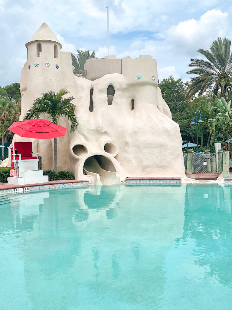 Swimming Pool and Mickey-shaped sand castle water slide at Disney's Old Key West Resort.