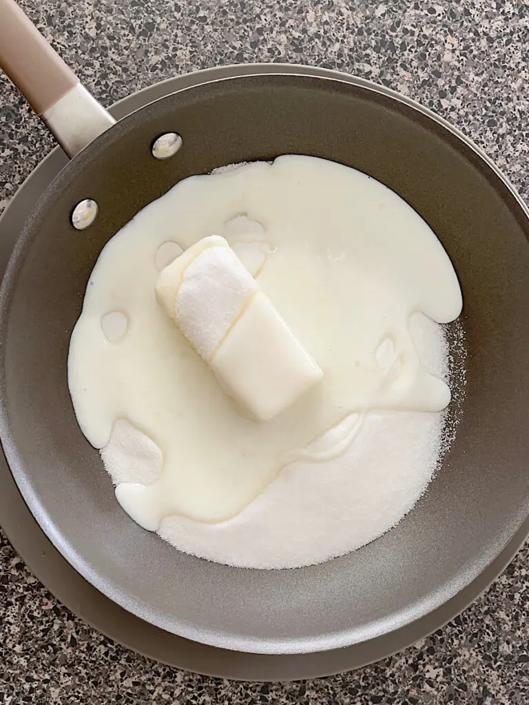 Buttermilk, butter, and sugar in a pan to make syrup.