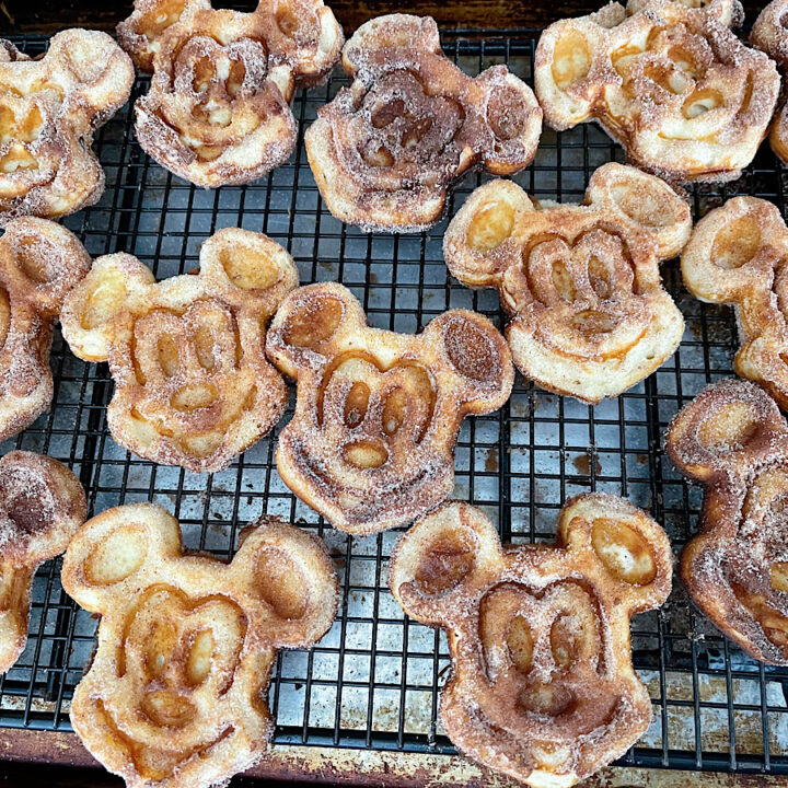 Mickey waffles coated in butter and cinnamon sugar.