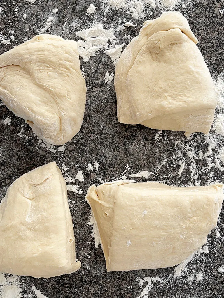 Roll dough cut into fourths.