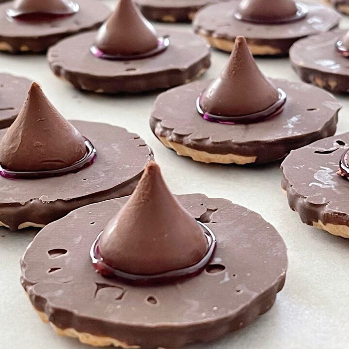 Witch hat cookies made from fudge stripe cookies and Hershey's kisses.