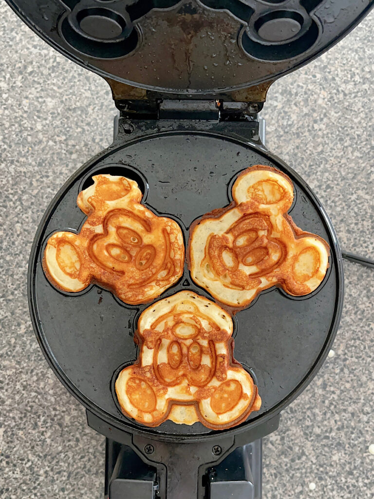 Mickey waffles in a Mickey waffle iron.