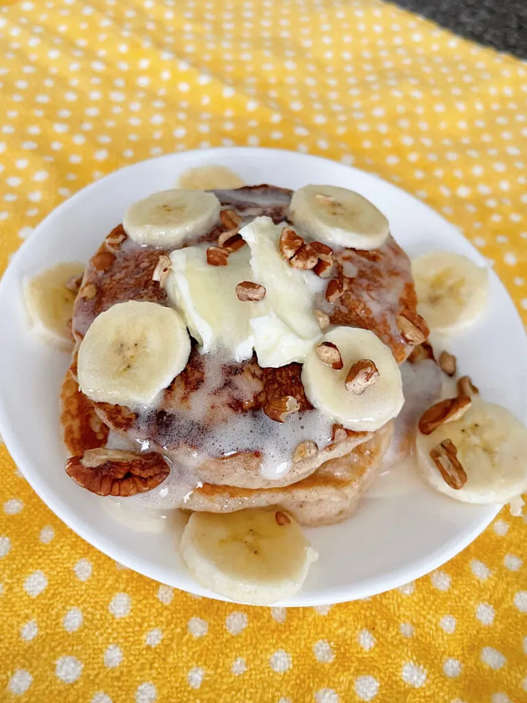 A plate of banana pancakes made with pancake mix.