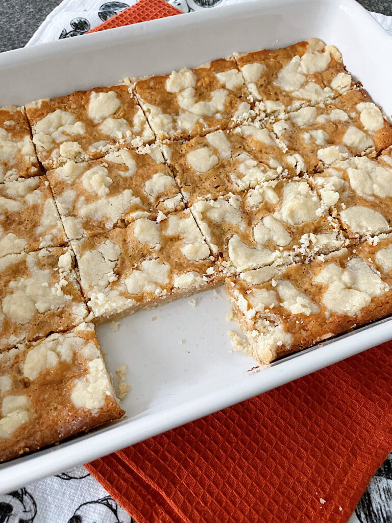 Caramel shortbread bars in a baking dish.