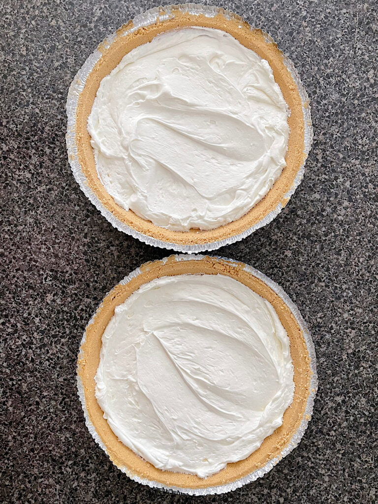 Two pie crusts with no bake cheesecake filling.